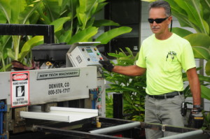 Portable roll-former at a jobsite on O`ahu.